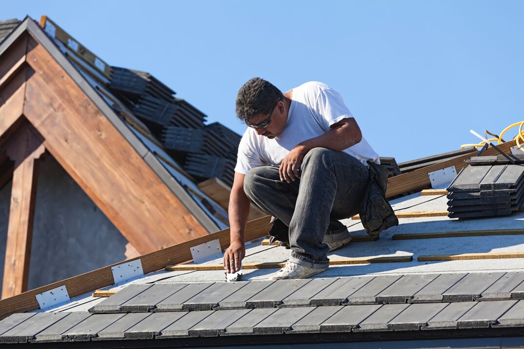 How do you install a residential roofing system?